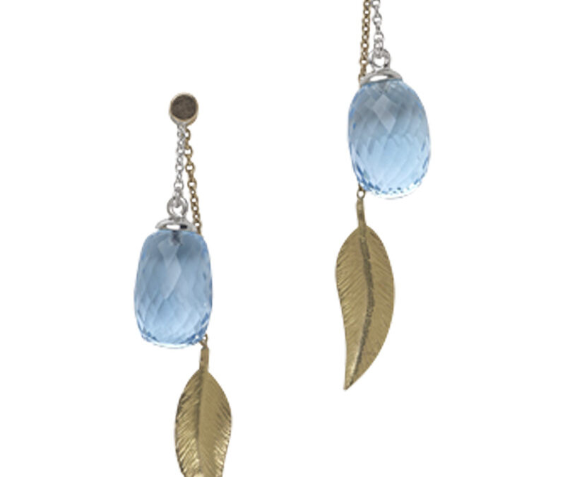 Cocktail long leaf earrings with blue topaz acorns in 18k white and yellow gold