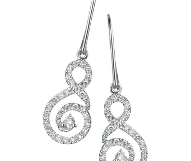 Diamond set swirl drop earrings on french wires in 18k white gold